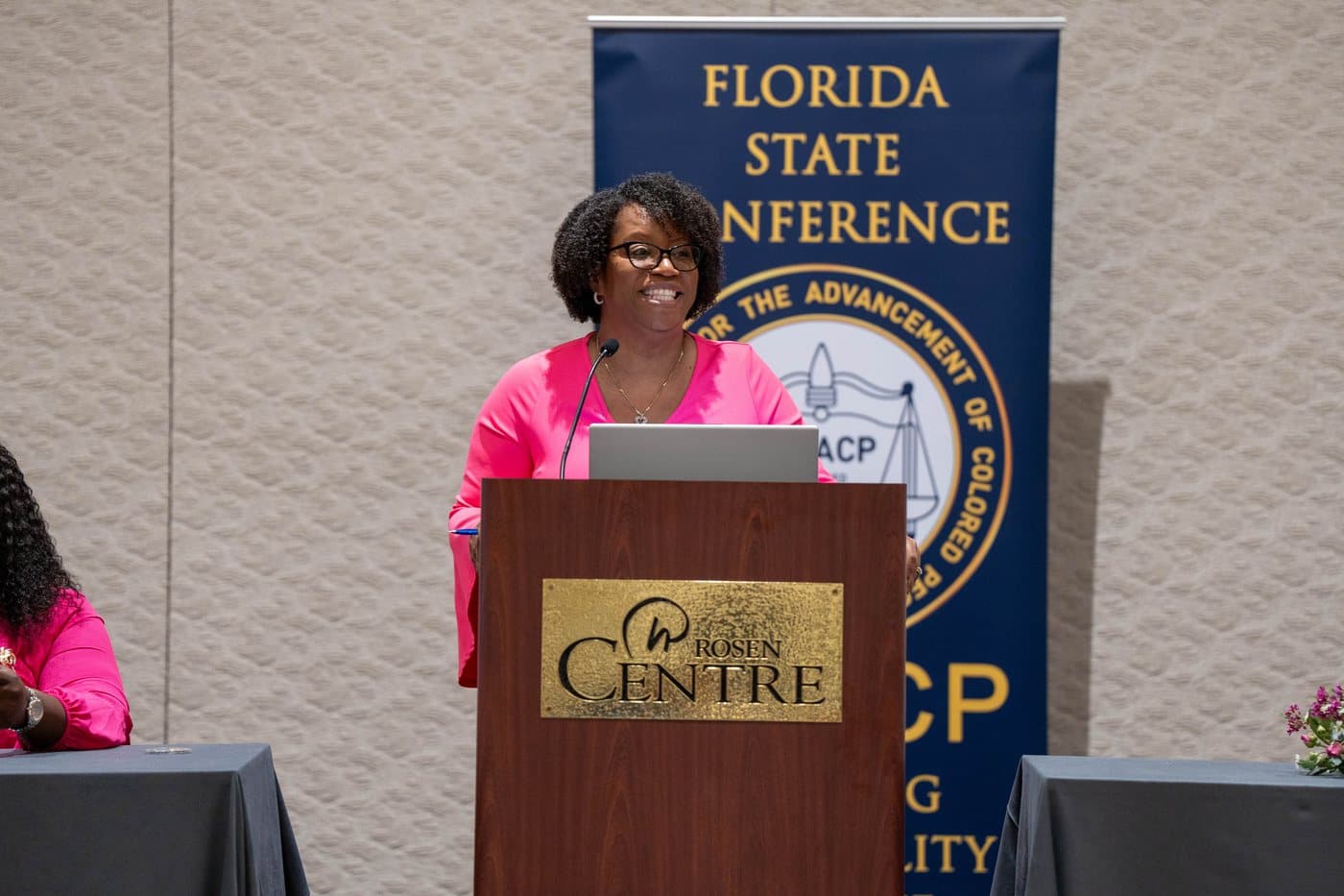 Rachel at the podium