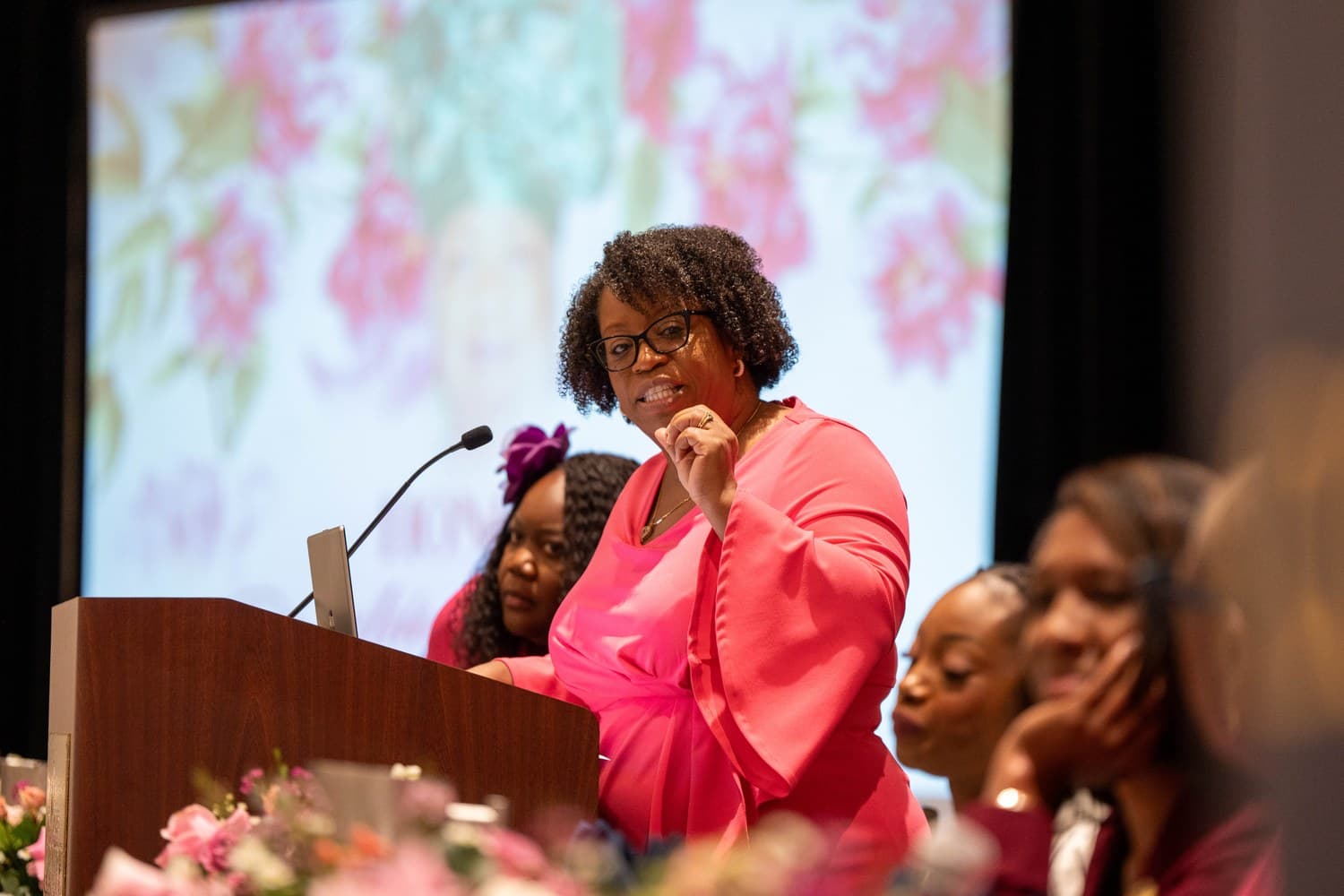 Rachel Nelson speaking to a room of women